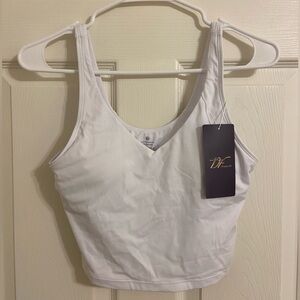 Dragon fit white cropped workout bra with padding. NWTS. size: small